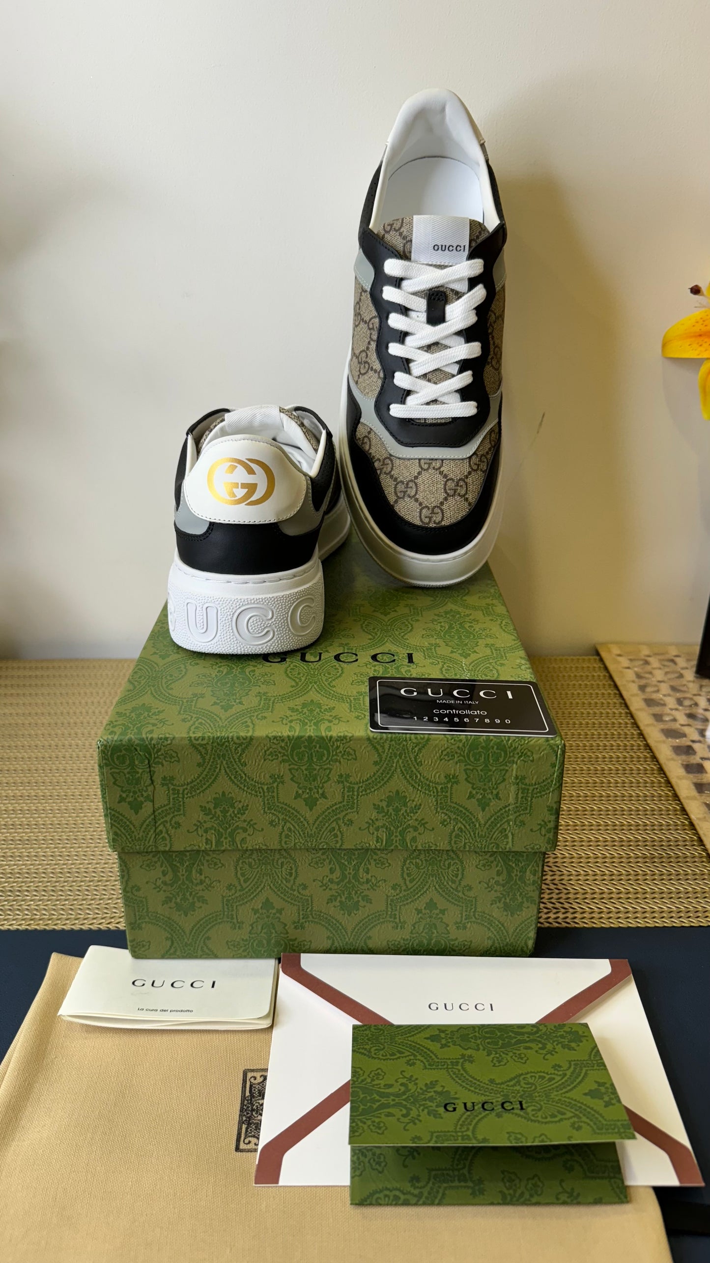Gucci
GG Supreme panelled sneakers